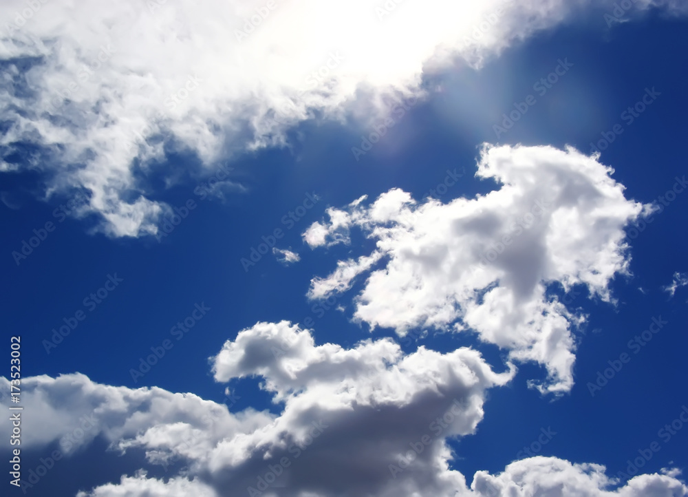 Fototapeta premium Blue sky with fluffy white clouds in day light