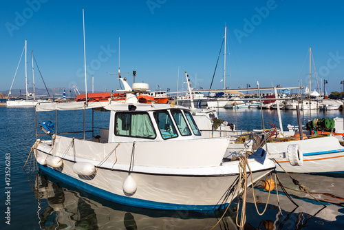  Fishing boats docked in the port of Naxos town (Chora). Cyclades Islands, Greece.