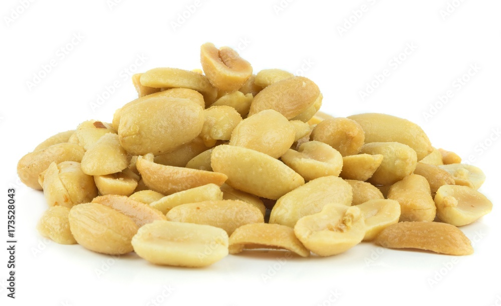 A pile of salted peanuts on a white background A pile of salted peanuts on a white background
