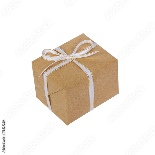 wrapped brown present box with white ribbon bow, isolated on white