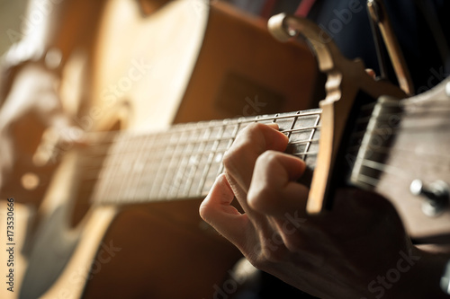 hand of guitarist and chord of guitar. photo