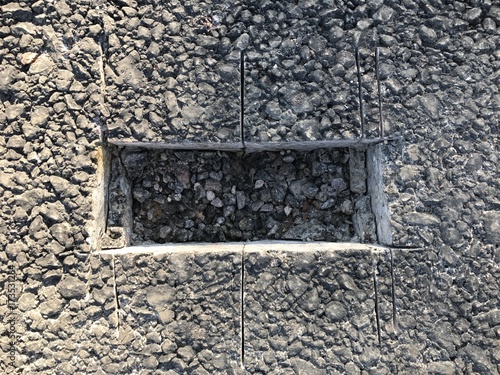 Place of selection of the kernel in the form of a rectangular from asphalt concrete pavement. Kern. Close-up