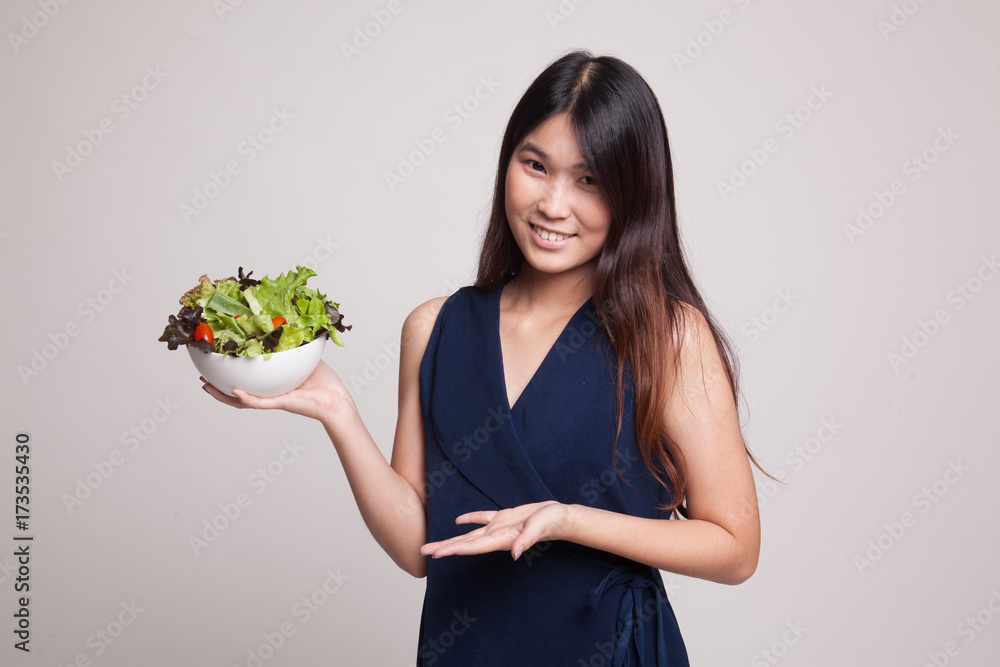 Healthy Asian woman with salad. Healthy Asian woman with salad.