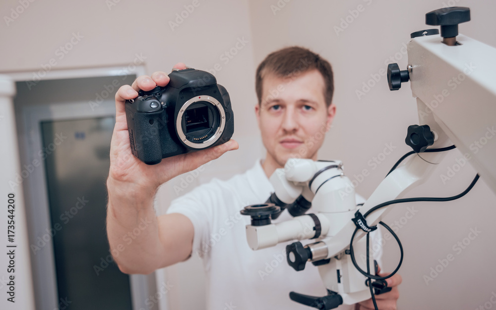 Microscope with photo camera in the dental office Microscope with photo camera in the dental office