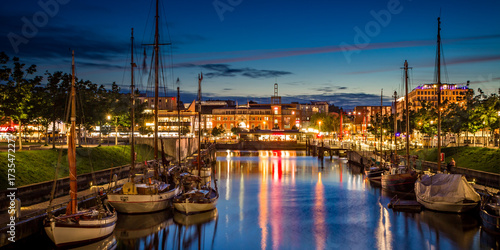 Wallpaper Mural Harbor at night with boats and colorful lights  Torontodigital.ca