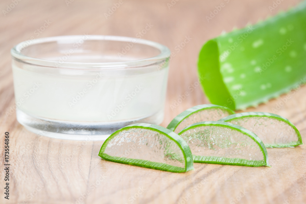 Fresh sliced aloe and aloe gel in a glass bowl Fresh sliced aloe and aloe gel in a glass bowl