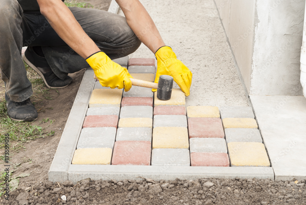 laying of paving slabs laying of paving slabs