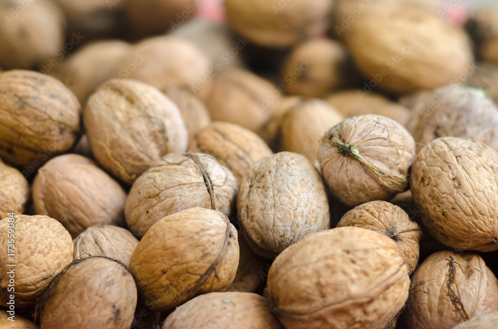 Walnuts background. Group walnuts. Healthy organic food concept. Walnuts background. Group walnuts. Healthy organic food concept.