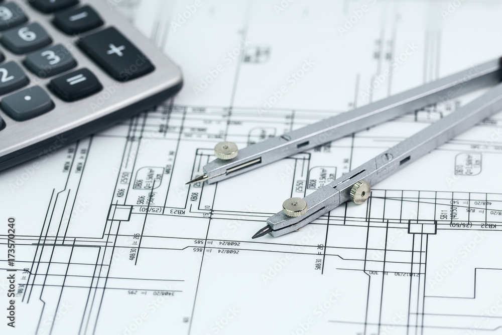 architectural background with plan, blueprint roll and drawing compass architectural background with plan, blueprint roll and drawing compass