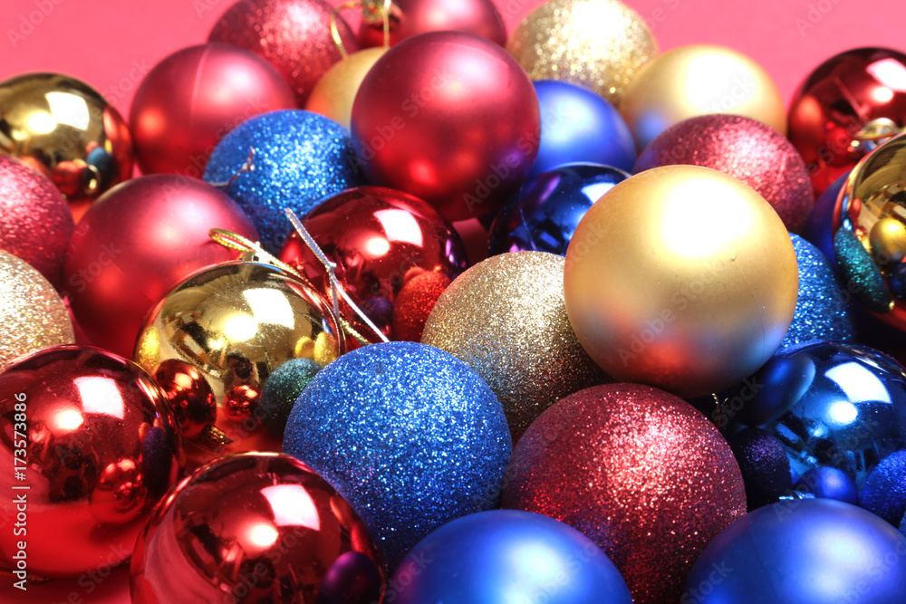 Christmas decorations with coloured balls on wooden background Christmas decorations with coloured balls on wooden background
