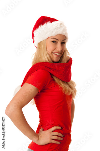 Cute blonde woman with santa hat siolated over white background