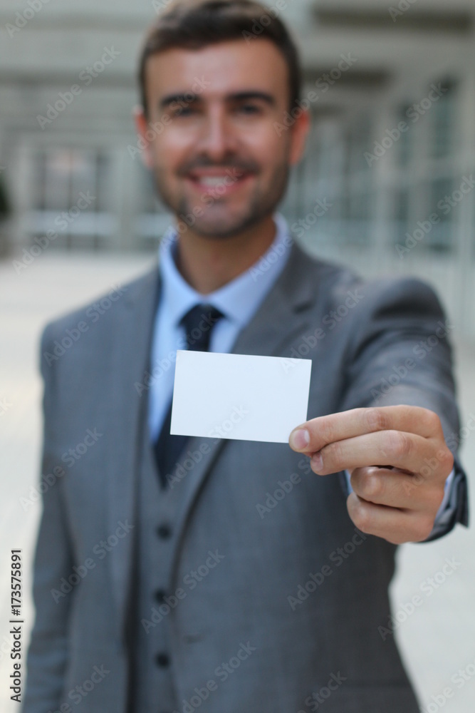Professional showing his business card Professional showing his business card