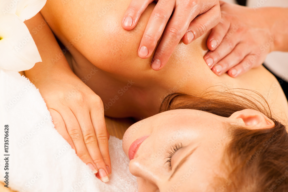 Fototapeta premium Body care. Spa body massage treatment. Woman having massage in the spa salon