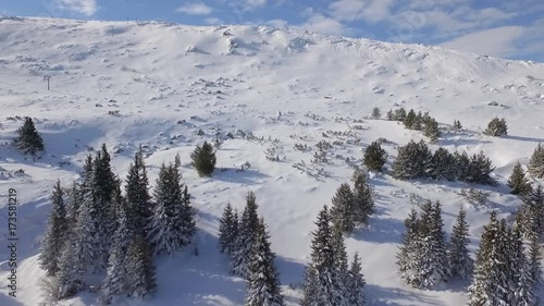 Sunny day at snow mountain / Aerial videos
