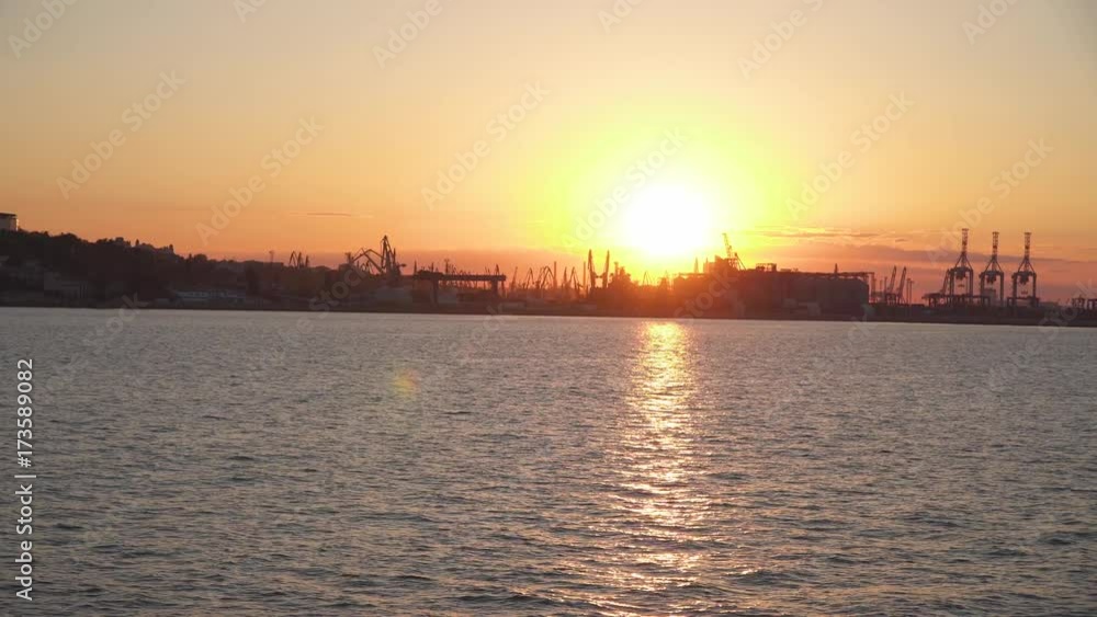 The sea. port and the setting sun The sea. port and the setting sun