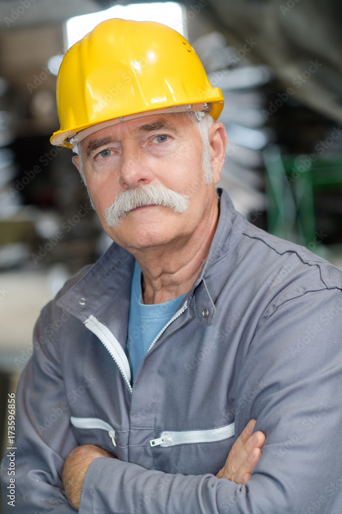 happy smiling senior construction worker or engineer happy smiling senior construction worker or engineer