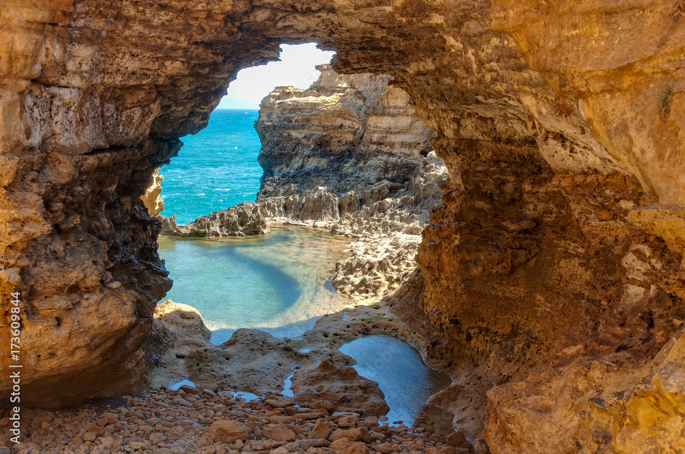 Arch and rock pools at the Grotto - Port Campbell, Victoria, Australia