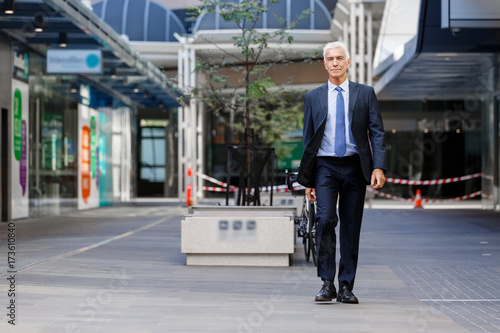 Portrait of confident businessman outdoors