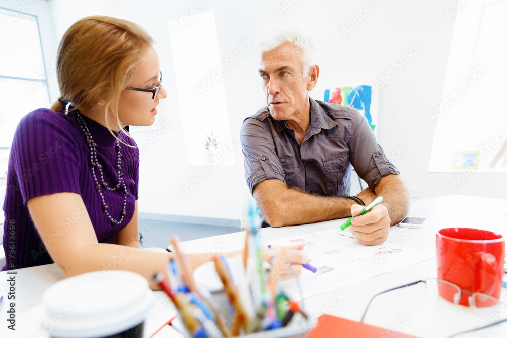 Co-workers working together Co-workers working together