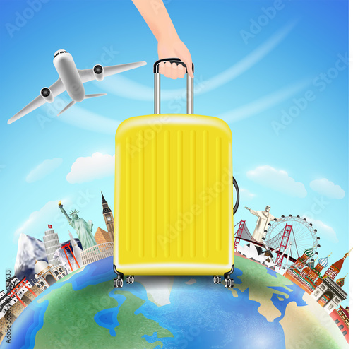 hand pick suitcase with world travel landmark