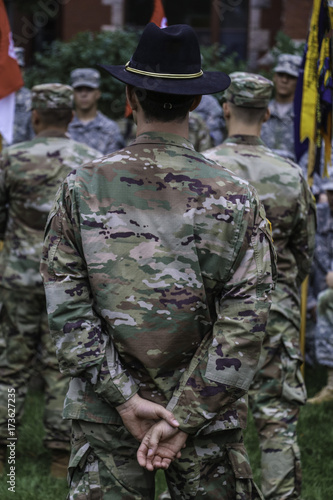 Commander standing from of soldiers