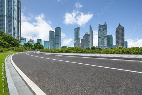 urban traffic road with cityscape in background in Shanghai China..