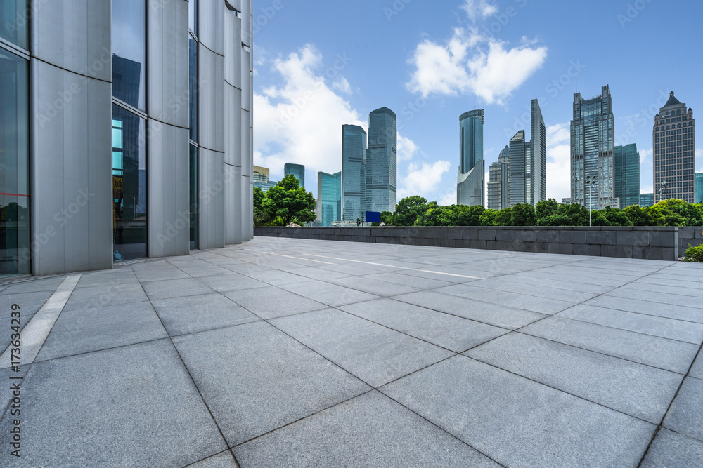cityscape and skyline of shanghai from empty brick floor. cityscape and skyline of shanghai from empty brick floor.