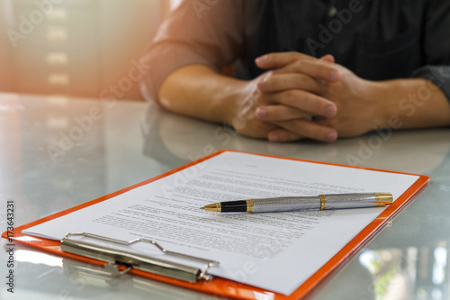 Close up of business man signing contract making a deal  business contract details. Businessman signing an official document