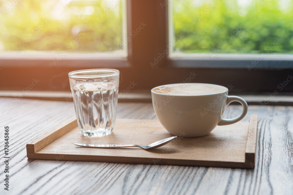 Fototapeta premium coffee cup on wooden table