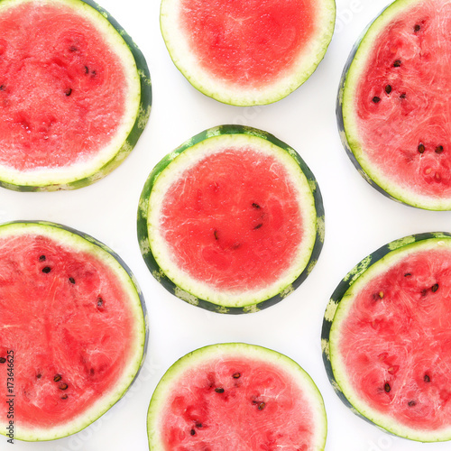 Pattern of watermelon lobules. Fresh watermelon, sliced in circles on a white background.