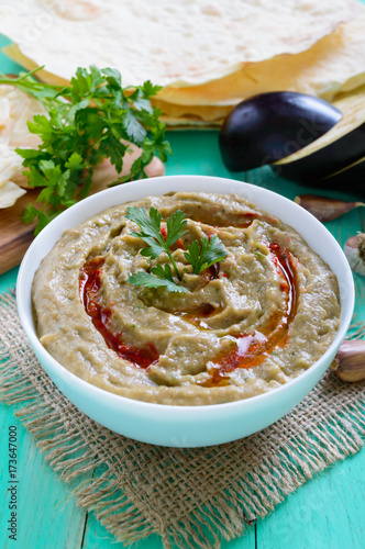 Baba ganush - hummus from eggplant with seasoning, parsley. Eastern cuisine. photo