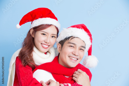 couple smile with merry christmas