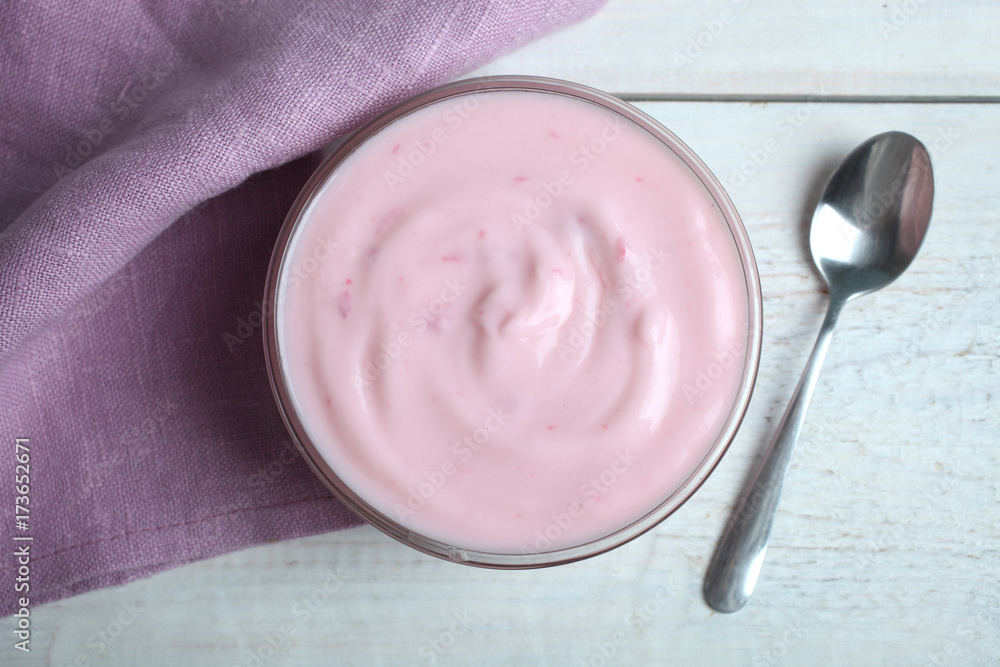 Yogurt, napkin and spoon Yogurt, napkin and spoon