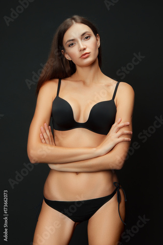Pretty slender girl in bikini. Model tests. No makeup.