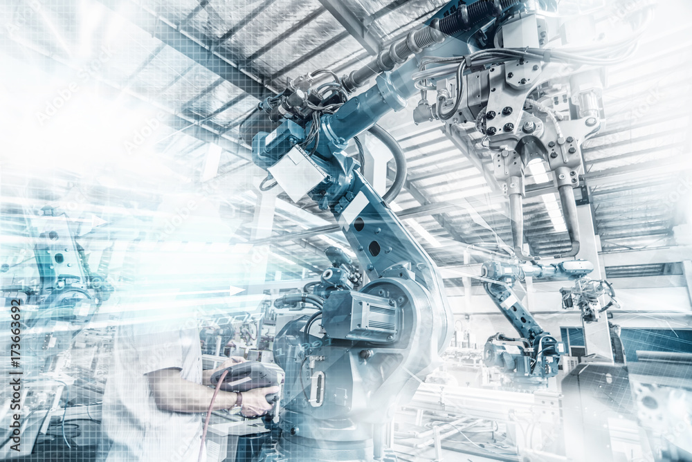 An industrial robot in a workshop An industrial robot in a workshop