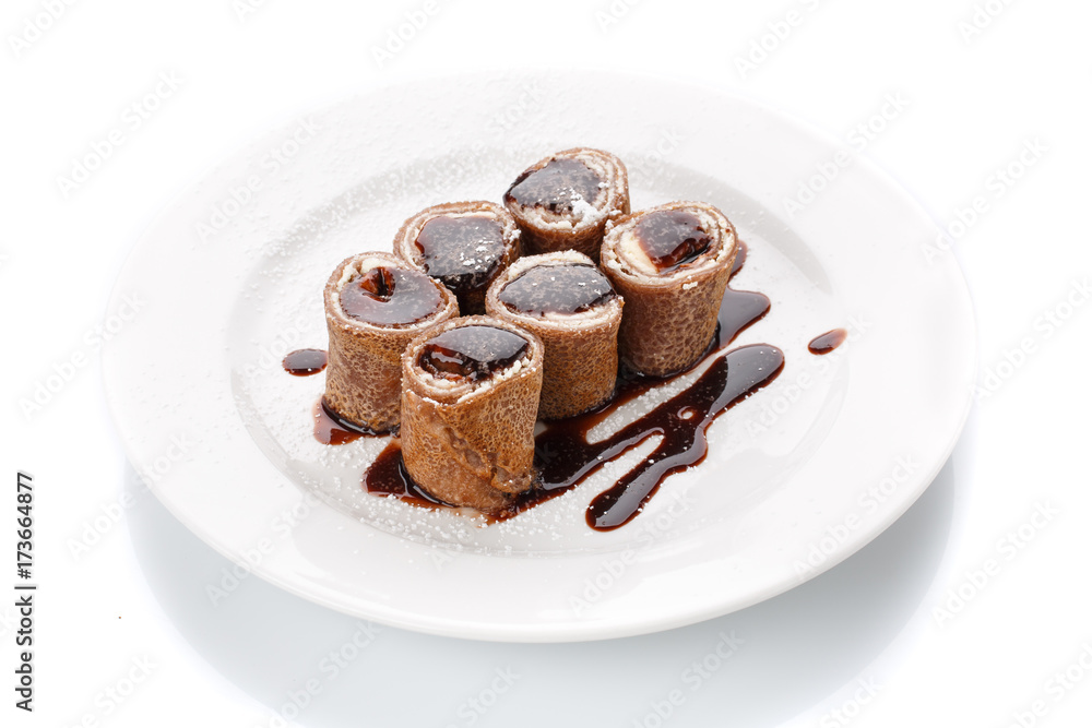 Fresh sweet chocolate pancakes with cheese and sauce Fresh sweet chocolate pancakes with cheese and sauce