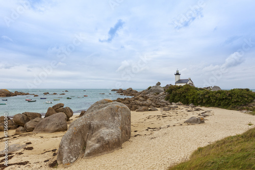 Beach and lighthouse of Pontusval, Brittany, France photo