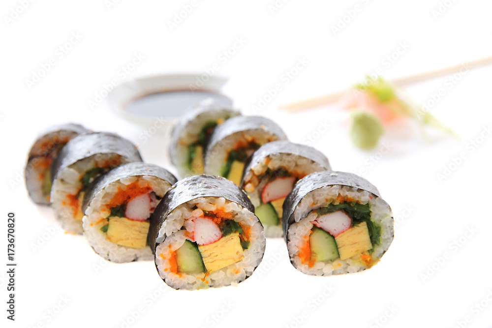 Futomaki sushi , Japanese roll rice egg avocado cucumber and caviar isolated in white background Futomaki sushi , Japanese roll rice egg avocado cucumber and caviar isolated in white background