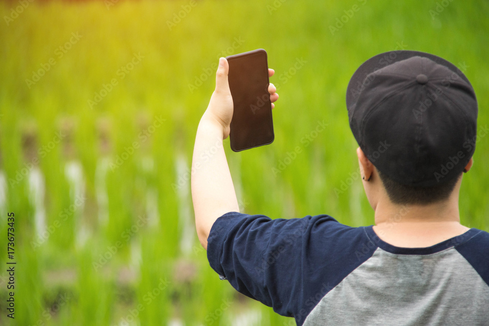 people holding smartphone with nature background. people holding smartphone with nature background.