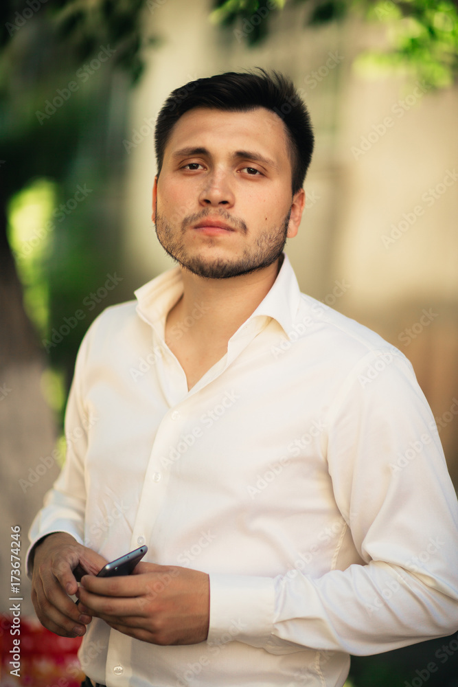 Handsome young man on nature background Handsome young man on nature background