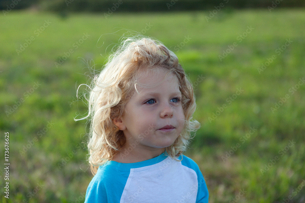 Small child enjoying of a sunny day Small child enjoying of a sunny day