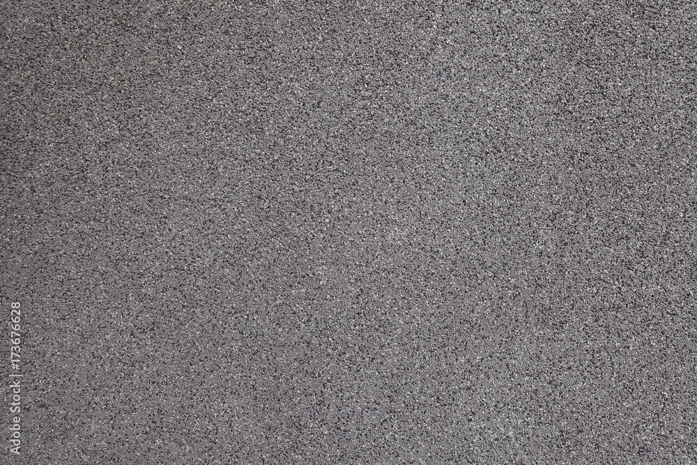 Grey exterior wall with pebbledash from the side Grey exterior wall with pebbledash from the side