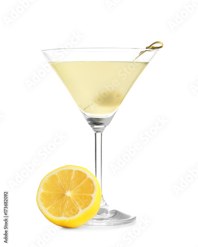 Glass of lemon drop martini with fruit on white background