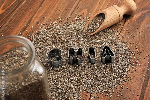 Chia seeds and letters on table