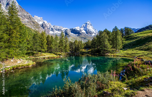 Fototapeta Naklejka Na Ścianę i Meble -  View of the Blue lake (Lago Blu) near Breuil-Cervinia and Cervino Mount (Matterhorn) in Val D'Aosta,Italy