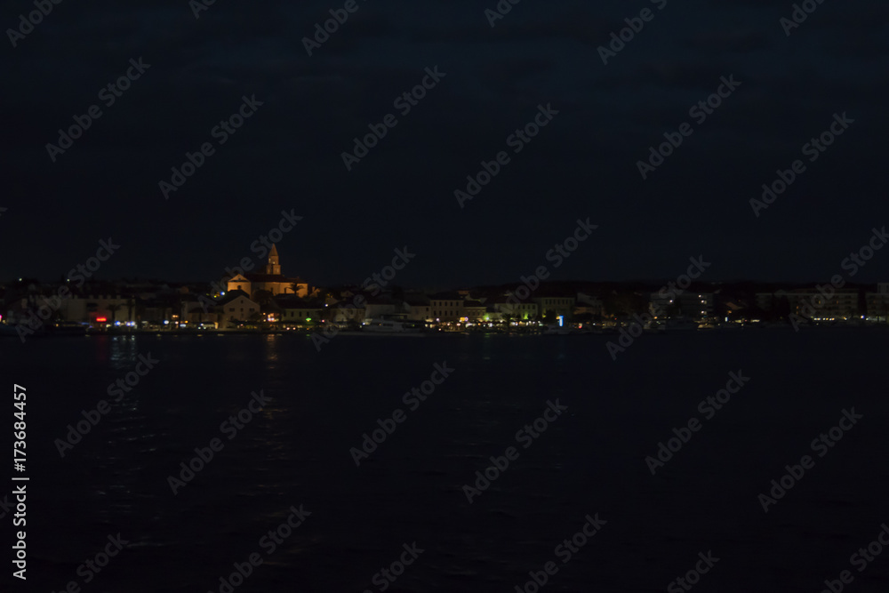 Biograd in Croatia mediteranian city shot at night over sea