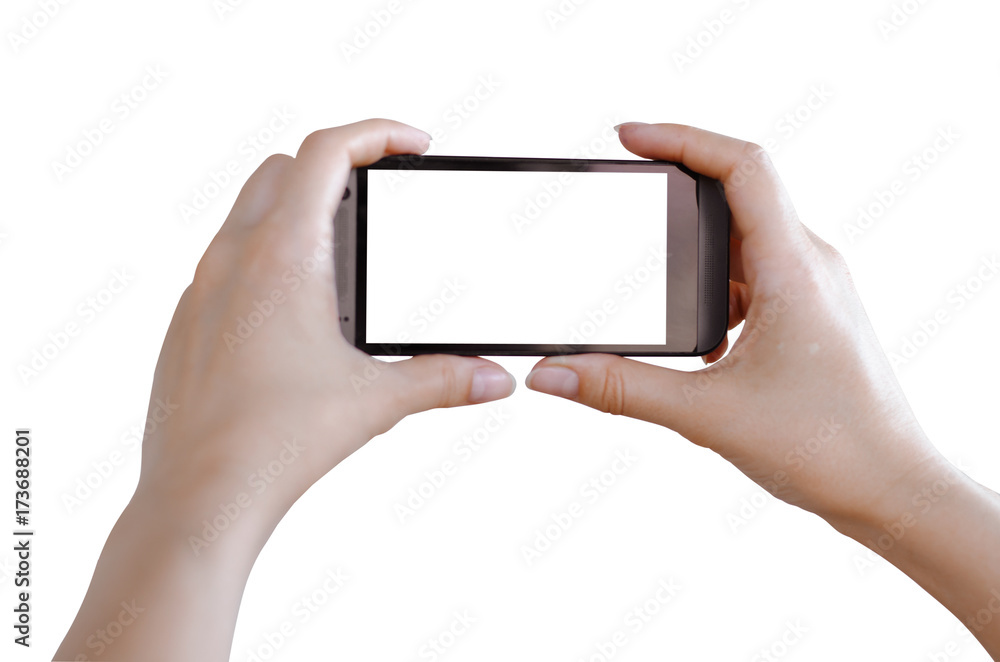 Female hands holding a phone isolated on white. Female hands holding a phone isolated on white.