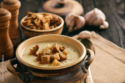 Billede på lærred Homemade garlic cream soup with croutons.