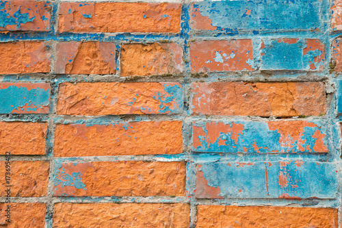 Old,aged,variegated, brick wall, moss growing in mortared seams. Great Background, texture or backdrop