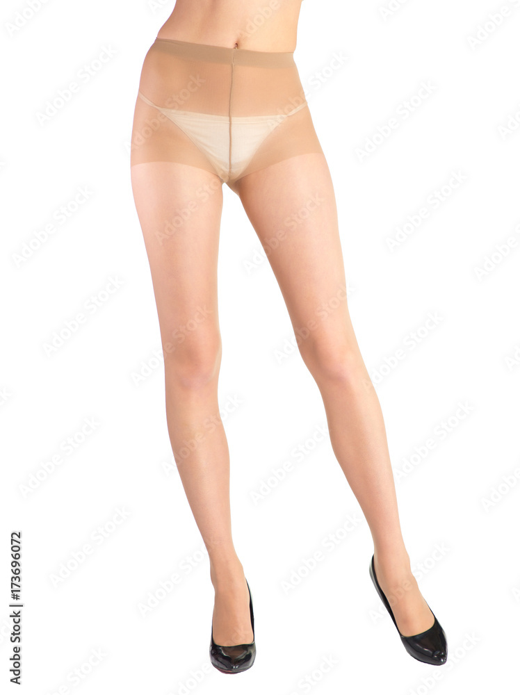 Shapely female legs dressed in tights body color Shapely female legs dressed in tights body color